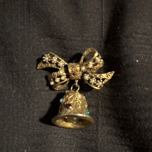 Elegant Gold Bell and Bow Brooch